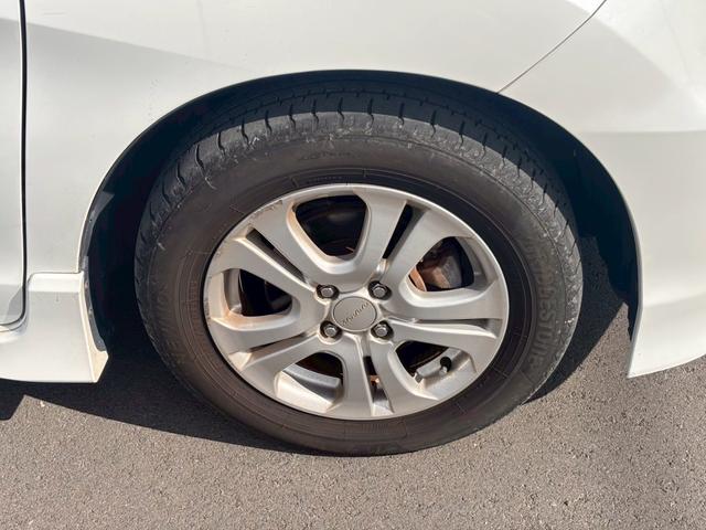 フリードハイブリッド ジャストセレクション メモリーナビ フルセグTV リアカメラ フリップダウンモニター スマートキー HIDヘッドライト 両側パワスラ Bluetooth クルコン 社外15インチアルミ ETC(17枚目)