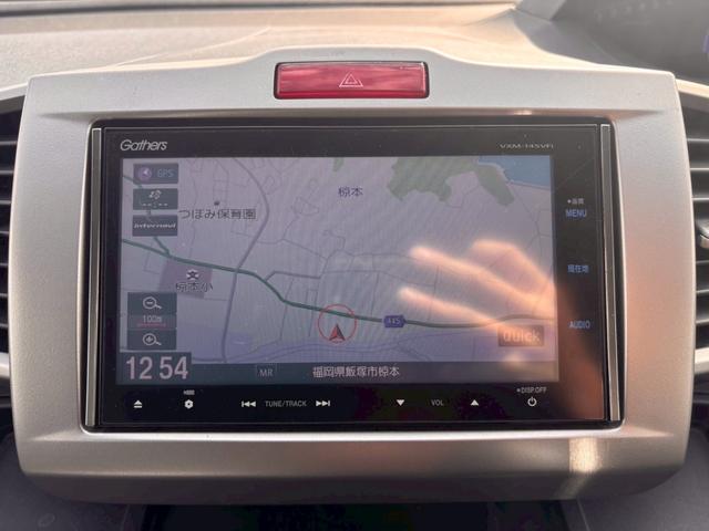 フリードハイブリッド ジャストセレクション メモリーナビ フルセグTV リアカメラ フリップダウンモニター スマートキー HIDヘッドライト 両側パワスラ Bluetooth クルコン 社外15インチアルミ ETC(22枚目)