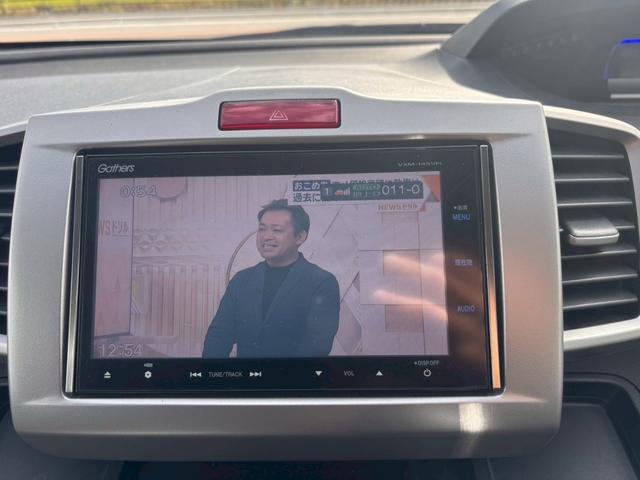 フリードハイブリッド ジャストセレクション メモリーナビ フルセグTV リアカメラ フリップダウンモニター スマートキー HIDヘッドライト 両側パワスラ Bluetooth クルコン 社外15インチアルミ ETC(23枚目)