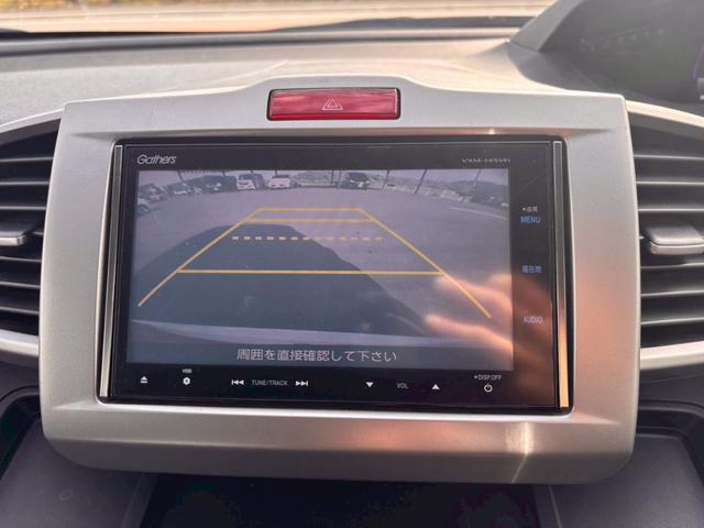 フリードハイブリッド ジャストセレクション メモリーナビ フルセグTV リアカメラ フリップダウンモニター スマートキー HIDヘッドライト 両側パワスラ Bluetooth クルコン 社外15インチアルミ ETC(24枚目)