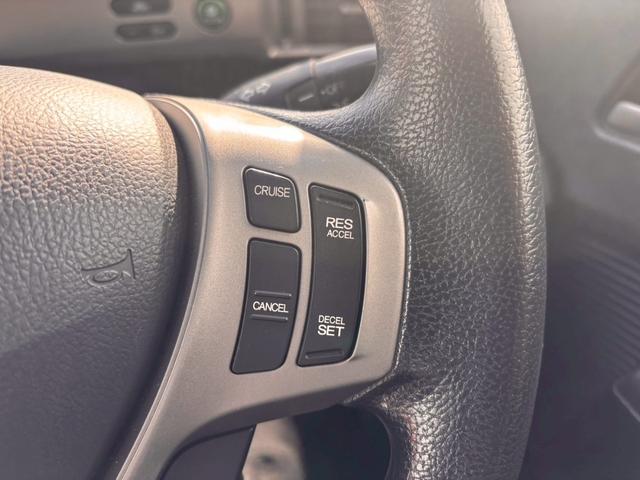 フリードハイブリッド ジャストセレクション メモリーナビ フルセグTV リアカメラ フリップダウンモニター スマートキー HIDヘッドライト 両側パワスラ Bluetooth クルコン 社外15インチアルミ ETC(29枚目)