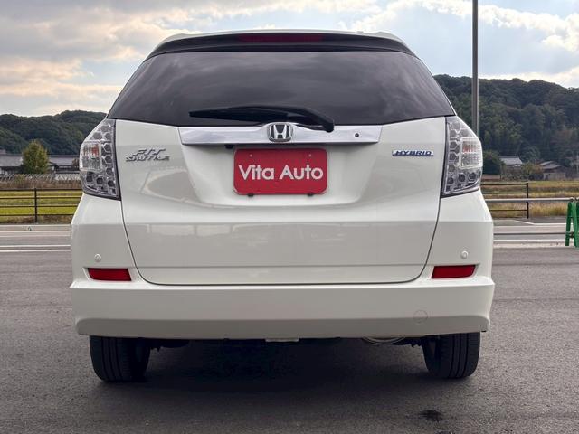 フィットシャトルハイブリッド ハイブリッド・スマートセレクション　ファインライン　メモリーナビ　ワンセグＴＶ　リアカメラ　スマートキー　ＨＩＤヘッドライト　シートヒーター　クルコン　社外１５インチアルミ　ＥＴＣ（11枚目）