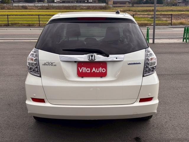 フィットシャトルハイブリッド ハイブリッド・スマートセレクション　ファインライン　メモリーナビ　ワンセグＴＶ　リアカメラ　スマートキー　ＨＩＤヘッドライト　シートヒーター　クルコン　社外１５インチアルミ　ＥＴＣ（12枚目）