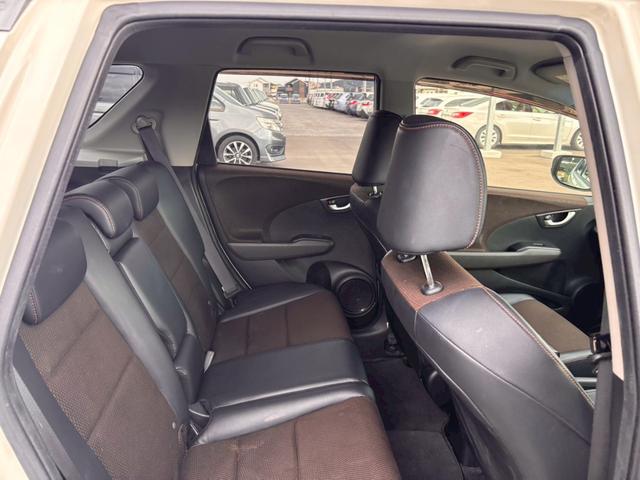 フィットシャトルハイブリッド ハイブリッド・スマートセレクション　ファインライン　メモリーナビ　ワンセグＴＶ　リアカメラ　スマートキー　ＨＩＤヘッドライト　シートヒーター　クルコン　社外１５インチアルミ　ＥＴＣ（39枚目）