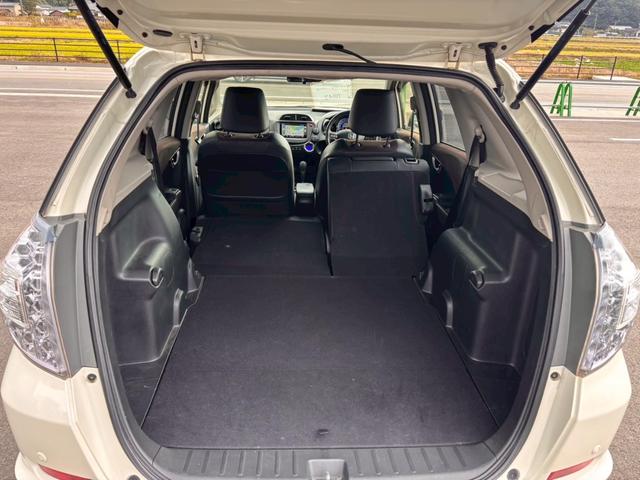 フィットシャトルハイブリッド ハイブリッド・スマートセレクション　ファインライン　メモリーナビ　ワンセグＴＶ　リアカメラ　スマートキー　ＨＩＤヘッドライト　シートヒーター　クルコン　社外１５インチアルミ　ＥＴＣ（41枚目）