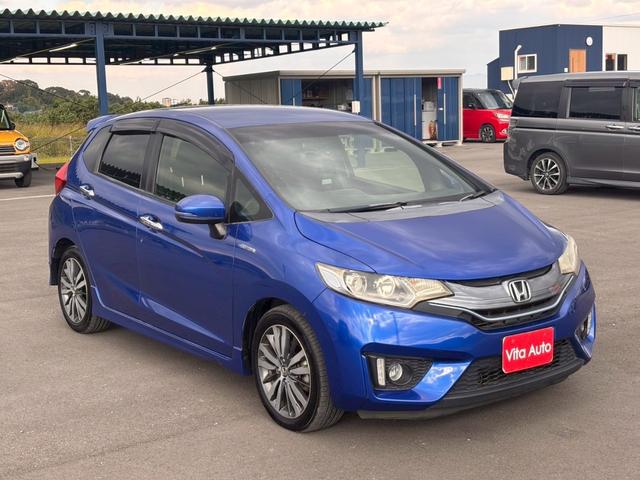 フィットハイブリッド Ｓパッケージ　メモリーナビ　フルセグＴＶ　リアカメラ　スマートキー　ＬＥＤヘッドライト　Ｂｌｕｅｔｏｏｔｈ　クルコン　純正１６インチアルミ　ＥＴＣ（3枚目）