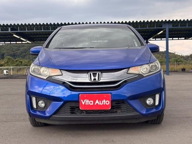 フィットハイブリッド Ｓパッケージ　メモリーナビ　フルセグＴＶ　リアカメラ　スマートキー　ＬＥＤヘッドライト　Ｂｌｕｅｔｏｏｔｈ　クルコン　純正１６インチアルミ　ＥＴＣ（4枚目）