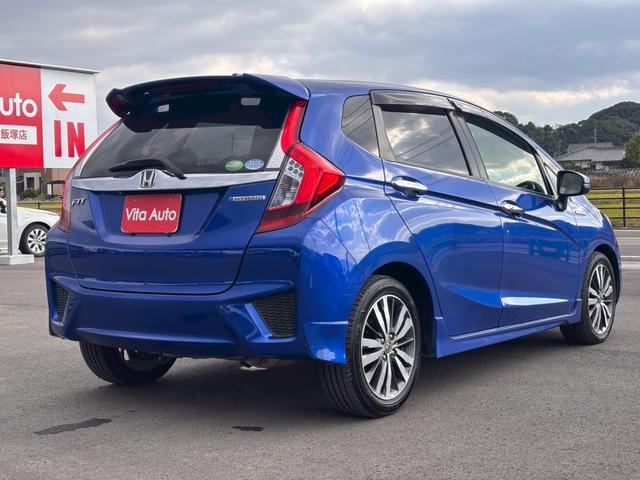 フィットハイブリッド Ｓパッケージ　メモリーナビ　フルセグＴＶ　リアカメラ　スマートキー　ＬＥＤヘッドライト　Ｂｌｕｅｔｏｏｔｈ　クルコン　純正１６インチアルミ　ＥＴＣ（14枚目）