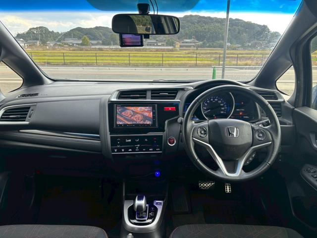 フィットハイブリッド Ｓパッケージ　メモリーナビ　フルセグＴＶ　リアカメラ　スマートキー　ＬＥＤヘッドライト　Ｂｌｕｅｔｏｏｔｈ　クルコン　純正１６インチアルミ　ＥＴＣ（19枚目）