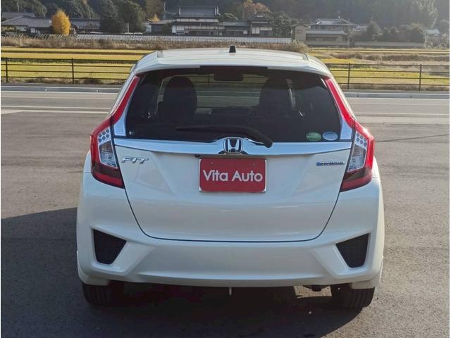 フィットハイブリッド Ｌパッケージ　メモリーナビ　リアカメラ　スマートキー　ＬＥＤヘッドライト　Ｂｌｕｅｔｏｏｔｈ　クルコン　純正１５インチ鉄　ＥＴＣ（12枚目）