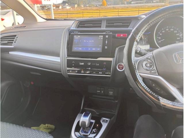 フィットハイブリッド Ｌパッケージ　メモリーナビ　リアカメラ　スマートキー　ＬＥＤヘッドライト　Ｂｌｕｅｔｏｏｔｈ　クルコン　純正１５インチ鉄　ＥＴＣ（18枚目）