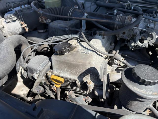 ハイラックスサーフ ＳＳＲ－Ｘ　ワイド　ＳＳＲ－Ｘ・雹害車・禁煙車・本州仕入れ・前期・サンルーフ・ワイドボディ・背面タイヤ・パートタイム四駆・ルーフレール・リアスポイラー・純正１６インチアルミ・スタッドレス／ジオランダー（19枚目）