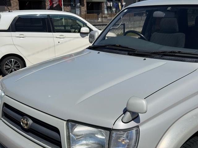 ハイラックスサーフ ＳＳＲ－Ｘ　ワイド　ＳＳＲ－Ｘ・雹害車・禁煙車・本州仕入れ・前期・サンルーフ・ワイドボディ・背面タイヤ・パートタイム四駆・ルーフレール・リアスポイラー・純正１６インチアルミ・スタッドレス／ジオランダー（27枚目）