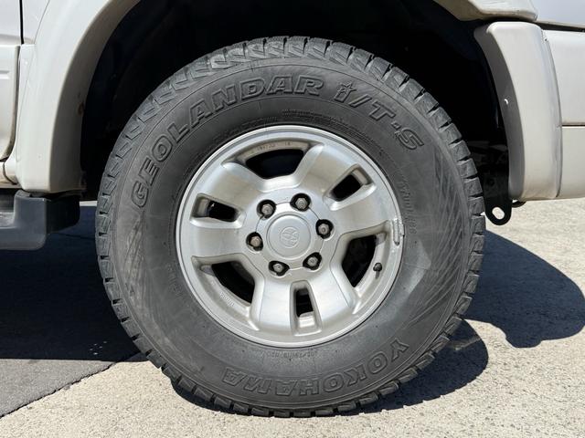 ハイラックスサーフ ＳＳＲ－Ｘ　ワイド　ＳＳＲ－Ｘ・雹害車・禁煙車・本州仕入れ・前期・サンルーフ・ワイドボディ・背面タイヤ・パートタイム四駆・ルーフレール・リアスポイラー・純正１６インチアルミ・スタッドレス／ジオランダー（36枚目）