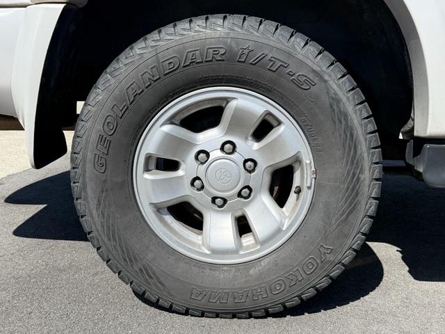 ハイラックスサーフ ＳＳＲ－Ｘ　ワイド　ＳＳＲ－Ｘ・雹害車・禁煙車・本州仕入れ・前期・サンルーフ・ワイドボディ・背面タイヤ・パートタイム四駆・ルーフレール・リアスポイラー・純正１６インチアルミ・スタッドレス／ジオランダー（37枚目）