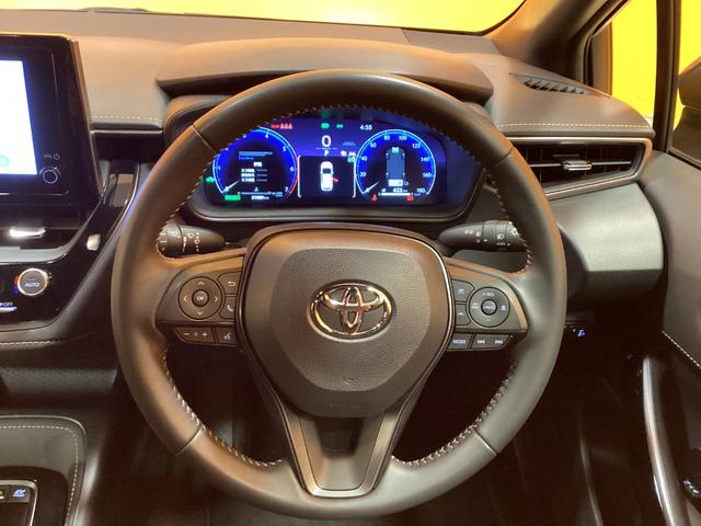 カローラツーリング ハイブリッド　ダブルバイビー　トヨタセーフティセンス　純正ディスプレイ　Ｂｌｕｅｔｏｏｔｈ対応　ＴＶ　Ｂカメラ　ＥＴＣ２．０　アダプティブクルーズコントロール　電子パーキング　ＬＥＤヘッドライト　フォグライト　スマートキー（6枚目）