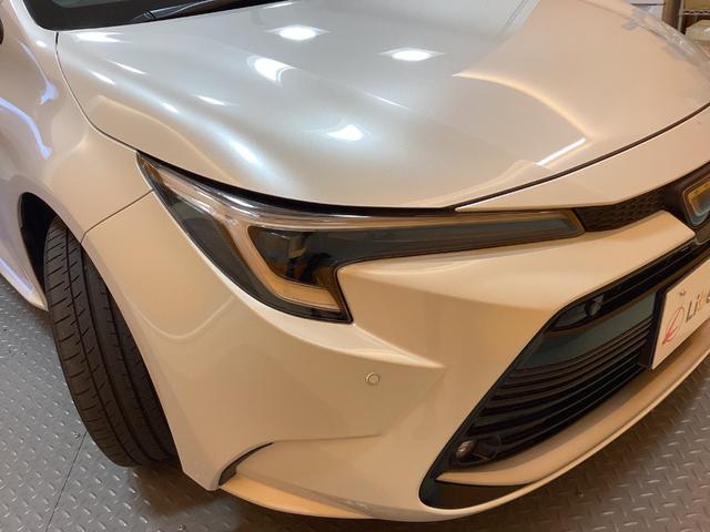 カローラツーリング ハイブリッド　ダブルバイビー　トヨタセーフティセンス　純正ディスプレイ　Ｂｌｕｅｔｏｏｔｈ対応　ＴＶ　Ｂカメラ　ＥＴＣ２．０　アダプティブクルーズコントロール　電子パーキング　ＬＥＤヘッドライト　フォグライト　スマートキー（26枚目）