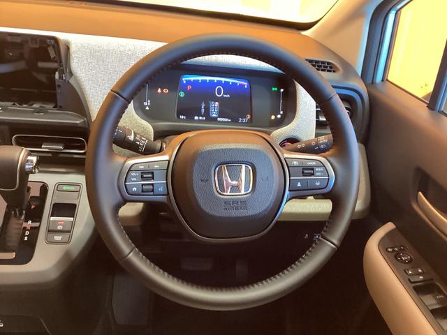 フリード エアー　ＥＸ　登録済未使用車　禁煙車　ＨｏｎｄａＳＥＮＳＩＮＧ　アダプティブクルーズコントロール　電子パーキング　両側自動ドア　ブラインドスポットモニター　ＬＥＤヘッドライト　スマートキー　プッシュスタート（6枚目）