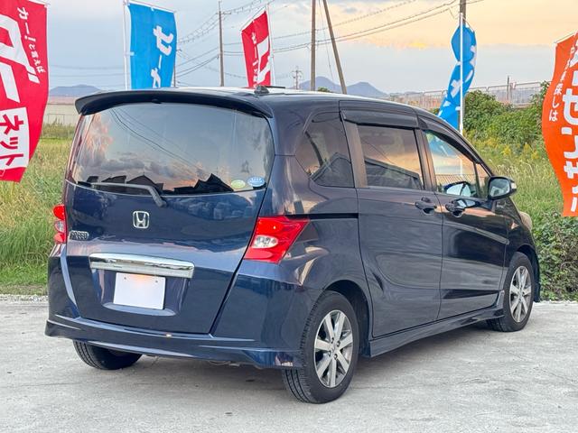 フリード G エアロ バックカメラ/ドライブレコーダー/ETC/キーレス/Bluetooth/ABS/7人乗り/HID/HDDナビ/アルミホイール/左パワースライドドア/オートライト/ステアリングスイッチ/衝突安全ボディー(2枚目)