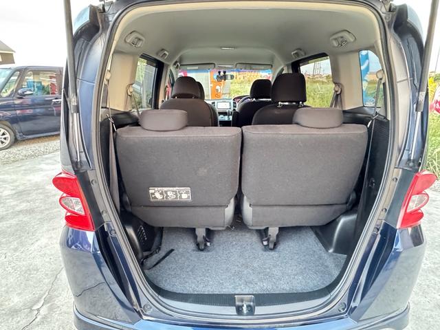 フリード G エアロ バックカメラ/ドライブレコーダー/ETC/キーレス/Bluetooth/ABS/7人乗り/HID/HDDナビ/アルミホイール/左パワースライドドア/オートライト/ステアリングスイッチ/衝突安全ボディー(14枚目)