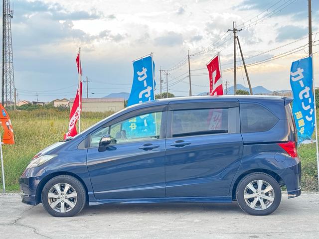 フリード G エアロ バックカメラ/ドライブレコーダー/ETC/キーレス/Bluetooth/ABS/7人乗り/HID/HDDナビ/アルミホイール/左パワースライドドア/オートライト/ステアリングスイッチ/衝突安全ボディー(34枚目)