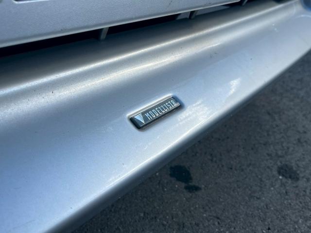 ハイエースコミューター スーパーロングGL 純正SDナビ 純正フリップダウンモニター11インチ 純正ドラレコ ビルドインETC モデリスタフロントスポイラー ソナー 純正アルミホイール15インチ リヤクーラー リヤヒーター チップアップシート(9枚目)