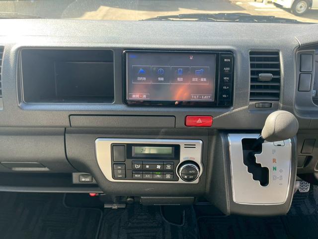 ハイエースコミューター スーパーロングGL 純正SDナビ 純正フリップダウンモニター11インチ 純正ドラレコ ビルドインETC モデリスタフロントスポイラー ソナー 純正アルミホイール15インチ リヤクーラー リヤヒーター チップアップシート(14枚目)