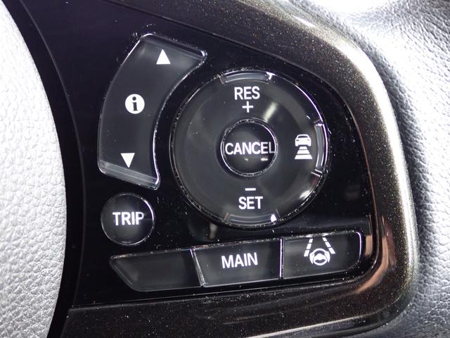 N-BOXカスタム G・EXターボホンダセンシング 純正8インチナビ CD録音 DVD再生 フルセグTV Bluetoothオーディオ 両側パワースライドドア Rカメラ ETC 助手席シートバックテーブル シートヒーター 革巻きハンドル(27枚目)