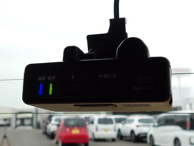 N-BOXカスタム G・EXターボホンダセンシング 純正8インチナビ CD録音 DVD再生 フルセグTV Bluetoothオーディオ 両側パワースライドドア Rカメラ ETC 助手席シートバックテーブル シートヒーター 革巻きハンドル(30枚目)