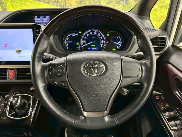 エスクァイア ハイブリッドGi プレミアムパッケージ アルパインナビ・トヨタセーフティセンス・バックモニター・ETC・両側パワースライドドア・フリップダウンモニター・ウッドコンビハンドル・LEDヘッドライト・純正アルミ・ウインカーミラー・取説保証書(64枚目)