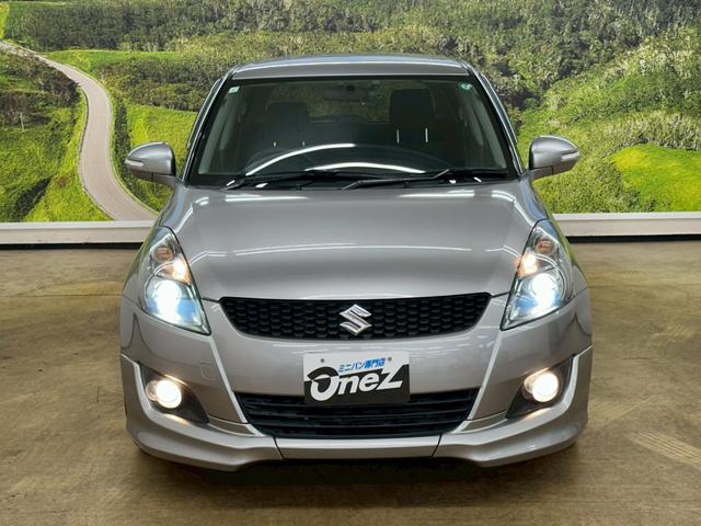 スイフト RS 社外ナビ・フルセグ・社外17インチアルミ・オートエアコン・HIDヘッドライト・ETC・スマートキー・プッシュスタート・バックモニター・純正エアロ・クルーズコントロール・革巻きステアリング・パドルシフト(3枚目)