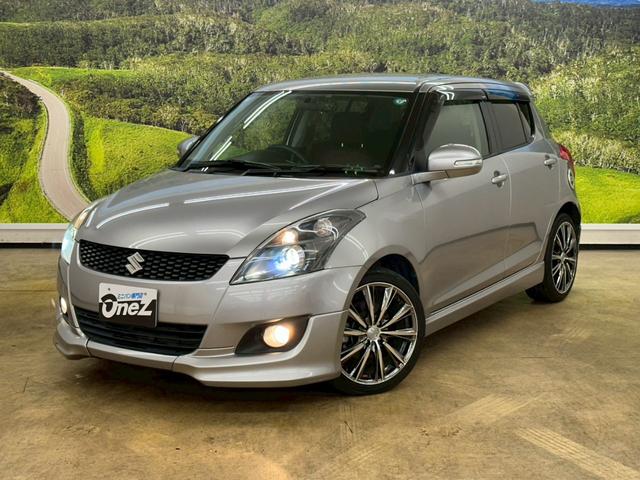 スイフト RS 社外ナビ・フルセグ・社外17インチアルミ・オートエアコン・HIDヘッドライト・ETC・スマートキー・プッシュスタート・バックモニター・純正エアロ・クルーズコントロール・革巻きステアリング・パドルシフト(5枚目)