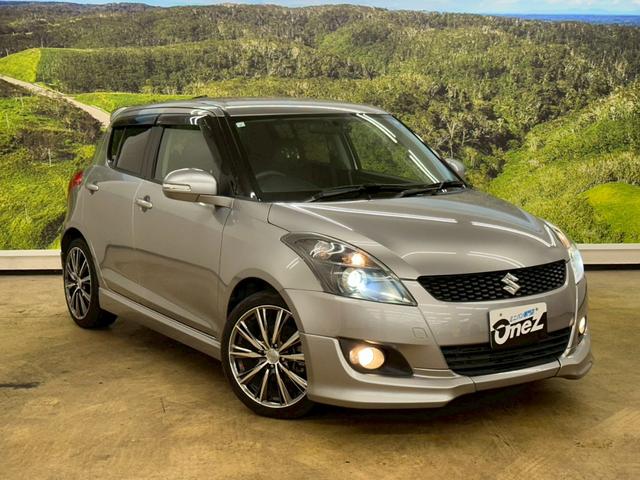 スイフト RS 社外ナビ・フルセグ・社外17インチアルミ・オートエアコン・HIDヘッドライト・ETC・スマートキー・プッシュスタート・バックモニター・純正エアロ・クルーズコントロール・革巻きステアリング・パドルシフト(7枚目)