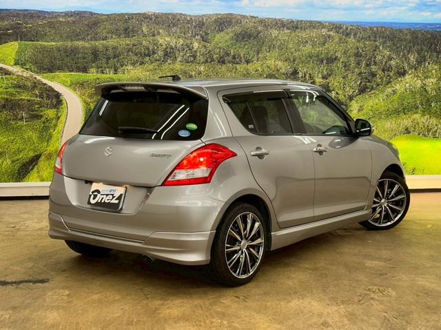 スイフト RS 社外ナビ・フルセグ・社外17インチアルミ・オートエアコン・HIDヘッドライト・ETC・スマートキー・プッシュスタート・バックモニター・純正エアロ・クルーズコントロール・革巻きステアリング・パドルシフト(8枚目)