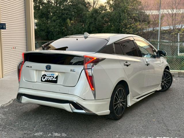 プリウス A モデリスタフルエアロ・純正ナビ・フルセグ対応・ビルトインETC・バックモニター・ドライブレコーダー前後・社外アルミ・デジタルインナーミラー・トヨタセーフティセンス・ステアリングスイッチ・LEDヘッド(9枚目)