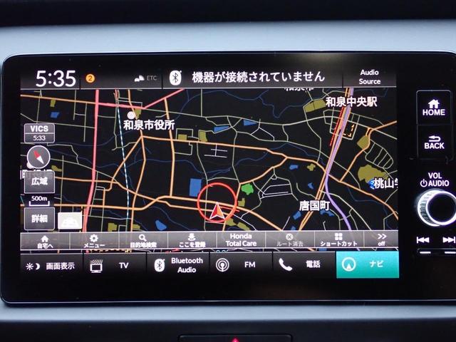 フィット ｅ：ＨＥＶホーム２０周年特別仕様車カーサ　純正インターナビ　フルセグ　Ｒカメラ　ＥＴＣ２．０　前後ドラレコ　サイドカーテンエアバック　ホンダセンシング　シートヒーター　アームレスト　オートリトラミラー　純正アルミホイール（6枚目）