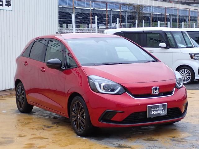 フィット ｅ：ＨＥＶホーム２０周年特別仕様車カーサ　純正インターナビ　フルセグ　Ｒカメラ　ＥＴＣ２．０　前後ドラレコ　サイドカーテンエアバック　ホンダセンシング　シートヒーター　アームレスト　オートリトラミラー　純正アルミホイール（10枚目）