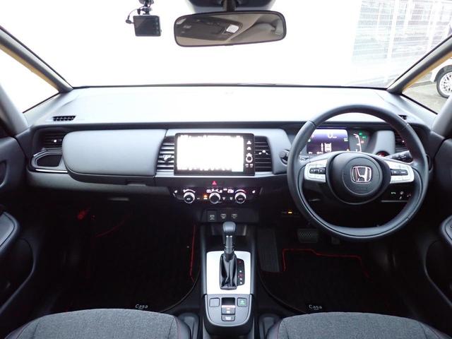 フィット ｅ：ＨＥＶホーム２０周年特別仕様車カーサ　純正インターナビ　フルセグ　Ｒカメラ　ＥＴＣ２．０　前後ドラレコ　サイドカーテンエアバック　ホンダセンシング　シートヒーター　アームレスト　オートリトラミラー　純正アルミホイール（22枚目）