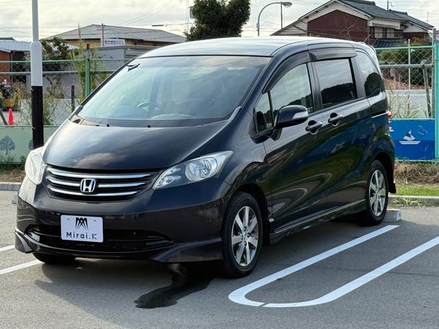 フリード Ｇ　エアロ　ハイウェイエディション　両側電動スライドドア　Ｂｌｕｅｔｏｏｔｈ　ワンセグ　バックカメラ　ＥＴＣ　オートライト　６人乗り　オートエアコン　電動格納ミラー　１５インチＡＷ　キーレス（12枚目）