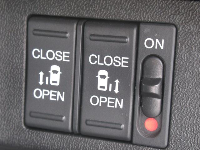 ステップワゴンスパーダ スパーダホンダセンシング 純正9インチナビ 純正ドラレコ前後 純正9インチリア席モニター バックカメラ 両側パワースライドドア わくわくゲート 後席ロールサンシェード パーキングセンサー前 ワンオーナー DVD HDMI(24枚目)