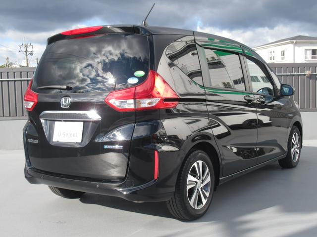 フリードハイブリッド ハイブリッド・Gホンダセンシング 純正9インチナビ タイヤ4本新品 両側パワースライドドア 運転席・助手席シートヒーター 電動格納ドアミラー 後席ロールサンシェード バックカメラ ETC LEDヘッドライト ワンオーナー(7枚目)