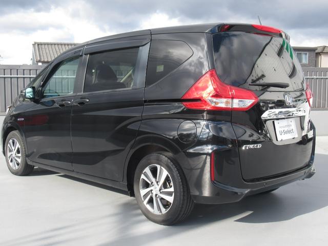 フリードハイブリッド ハイブリッド・Gホンダセンシング 純正9インチナビ タイヤ4本新品 両側パワースライドドア 運転席・助手席シートヒーター 電動格納ドアミラー 後席ロールサンシェード バックカメラ ETC LEDヘッドライト ワンオーナー(9枚目)