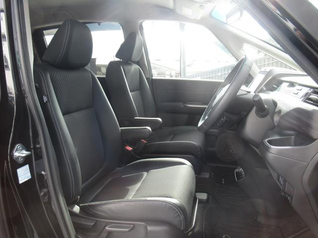 フリードハイブリッド ハイブリッド・Gホンダセンシング 純正9インチナビ タイヤ4本新品 両側パワースライドドア 運転席・助手席シートヒーター 電動格納ドアミラー 後席ロールサンシェード バックカメラ ETC LEDヘッドライト ワンオーナー(11枚目)