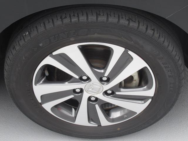 フリードハイブリッド ハイブリッド・Gホンダセンシング 純正9インチナビ タイヤ4本新品 両側パワースライドドア 運転席・助手席シートヒーター 電動格納ドアミラー 後席ロールサンシェード バックカメラ ETC LEDヘッドライト ワンオーナー(57枚目)