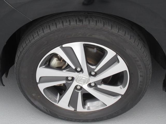 フリードハイブリッド ハイブリッド・Gホンダセンシング 純正9インチナビ タイヤ4本新品 両側パワースライドドア 運転席・助手席シートヒーター 電動格納ドアミラー 後席ロールサンシェード バックカメラ ETC LEDヘッドライト ワンオーナー(58枚目)