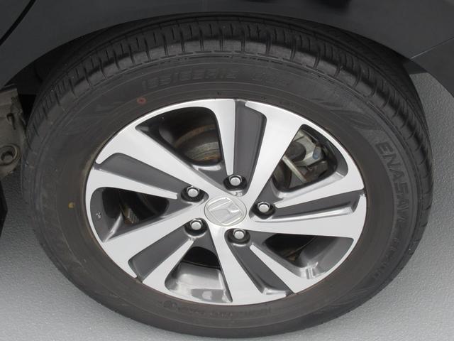 フリードハイブリッド ハイブリッド・Gホンダセンシング 純正9インチナビ タイヤ4本新品 両側パワースライドドア 運転席・助手席シートヒーター 電動格納ドアミラー 後席ロールサンシェード バックカメラ ETC LEDヘッドライト ワンオーナー(59枚目)