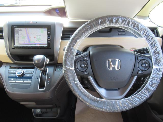 フリード 　ホンダセンシング　２列目リフトＵＰシート　福祉車両　純正ナビ　バックカメラ　ＬＥＤヘッドライト　アダプティブクルーズ　１オーナー　禁煙車　記録簿　前後ドラレコ　追突軽減ブレーキ　レーンキープ　４人乗（10枚目）