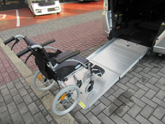 フリード Ｇ　車イス移動車　福祉車両　電動ウィンチリモコン付　禁煙車　アルミスロープ　左側Ｐスライドドア　キーレスキー　イクリプスメモリーナビ　フロントコーナーセンサー　オートＨＩＤヘッドライト　ＥＴＣ　バックＣ（21枚目）