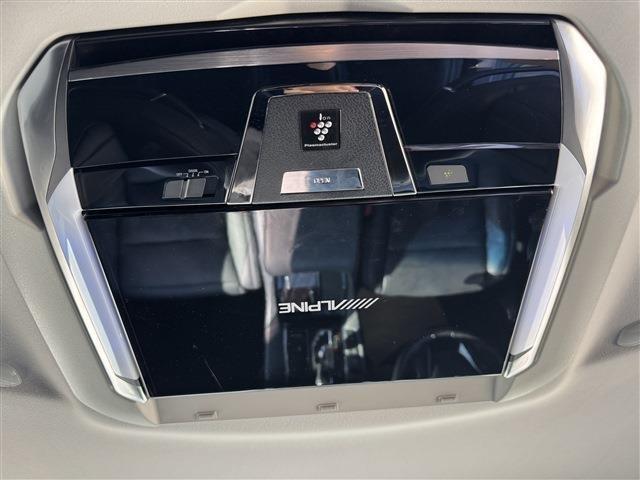 ヴェルファイア ２．５Ｚ　Ｇエディション　禁煙車　サンルーフ　黒半革　両側パワースライドドア　純正ＳＤナビ　フリップダウンモニター　パワーバックドア　パワーシート　シートメモリ　キャプテンシート　オットマン　バックカメラ　ＥＴＣ（12枚目）