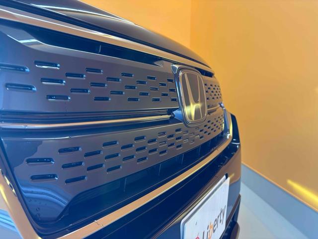 ステップワゴン スパーダ クリアランスソナー オートクルーズコントロール レーンアシスト 両側電動スライドドア オートライト 電動リアゲート スマートキー 電動格納ミラー シートヒーター 3列シート ウォークスルー オットマン(17枚目)